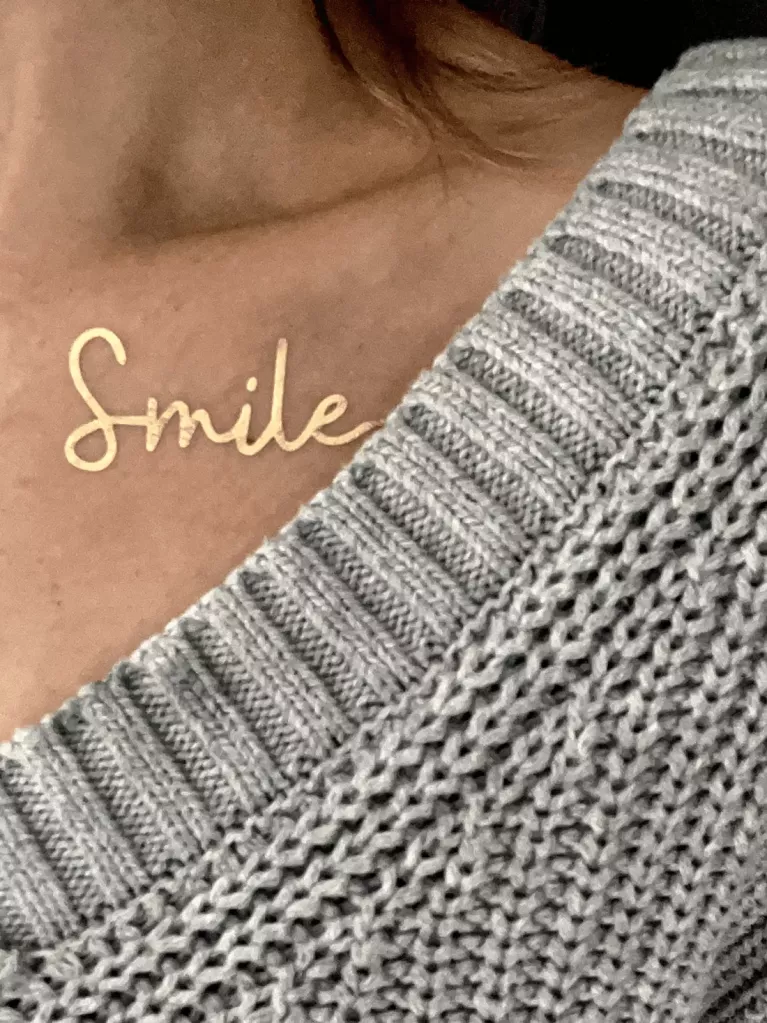 "Smile" Tattoo
